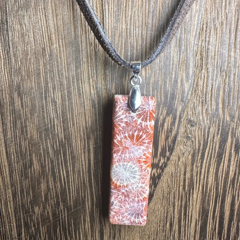 Dark Orange Coral Fossil Thin Rectangle Pendant Necklace on Brown Suede - Picture 1 of 13